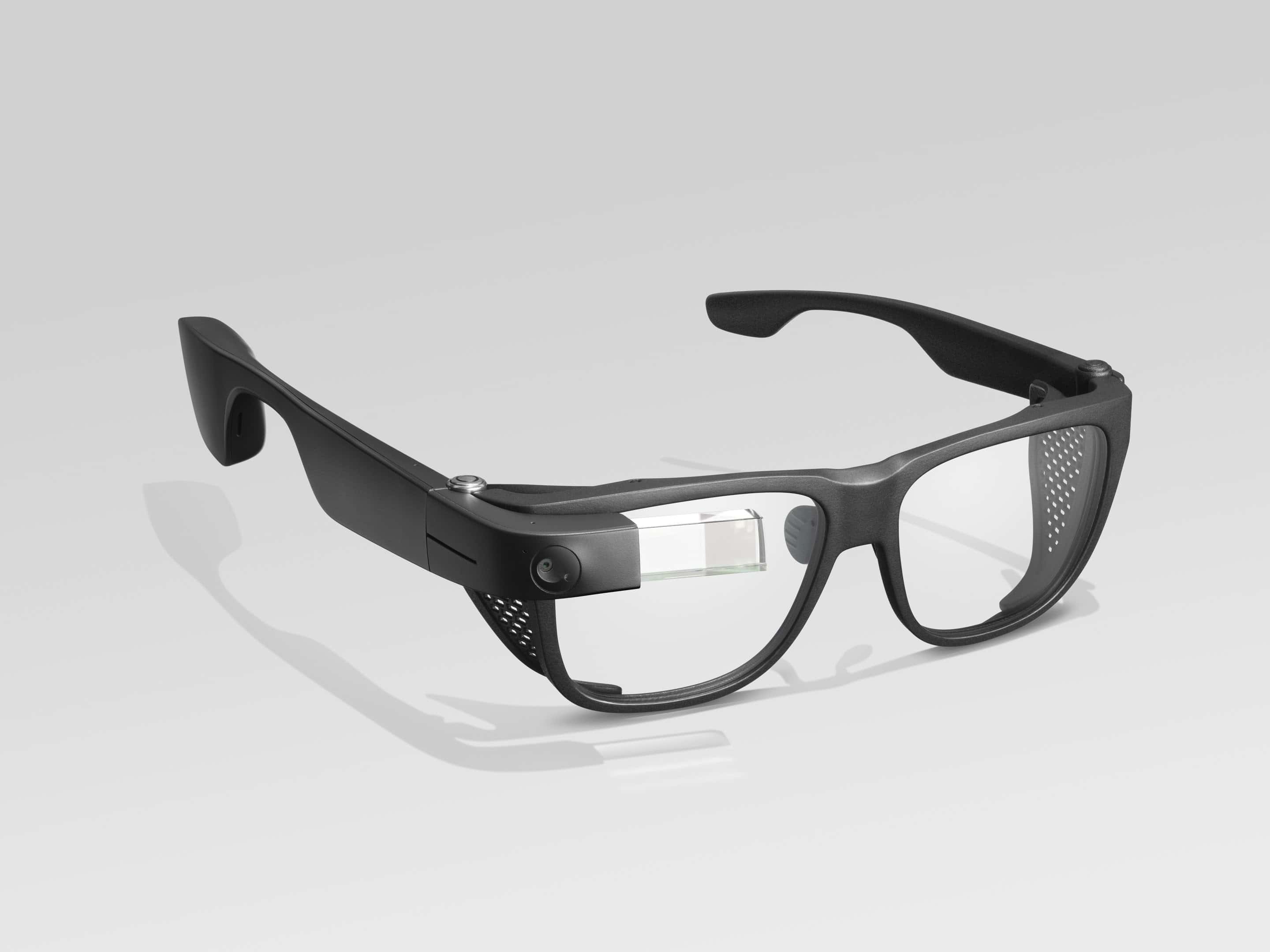 Photo of Envision Glasses with the Smith Optics frames; the frames are black plastic, 2 or 3 times thicker than the titanium frames